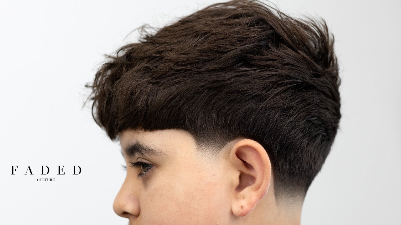 low taper fade with textured fringe
